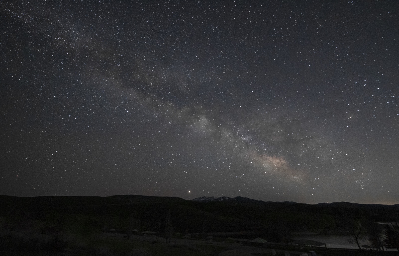 The Milky Way arching over the mountains of southern Utah during core season
